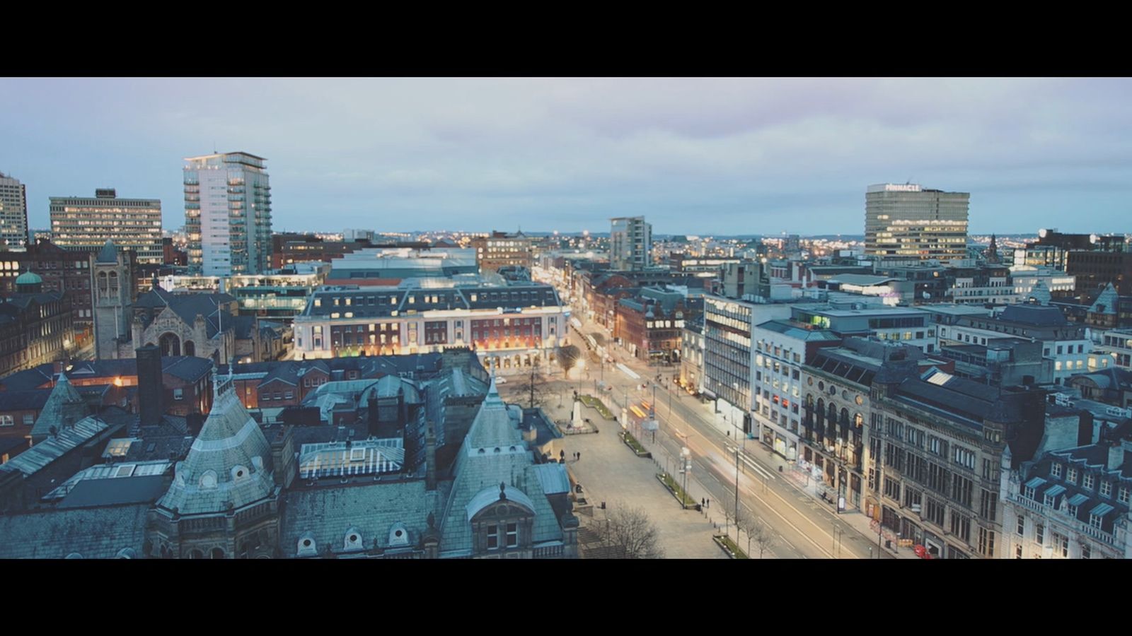 city of Leeds from the rooftops at dusk