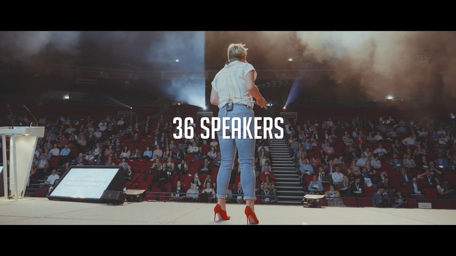 Speaker on stage in front of Audience at SearchLeeds