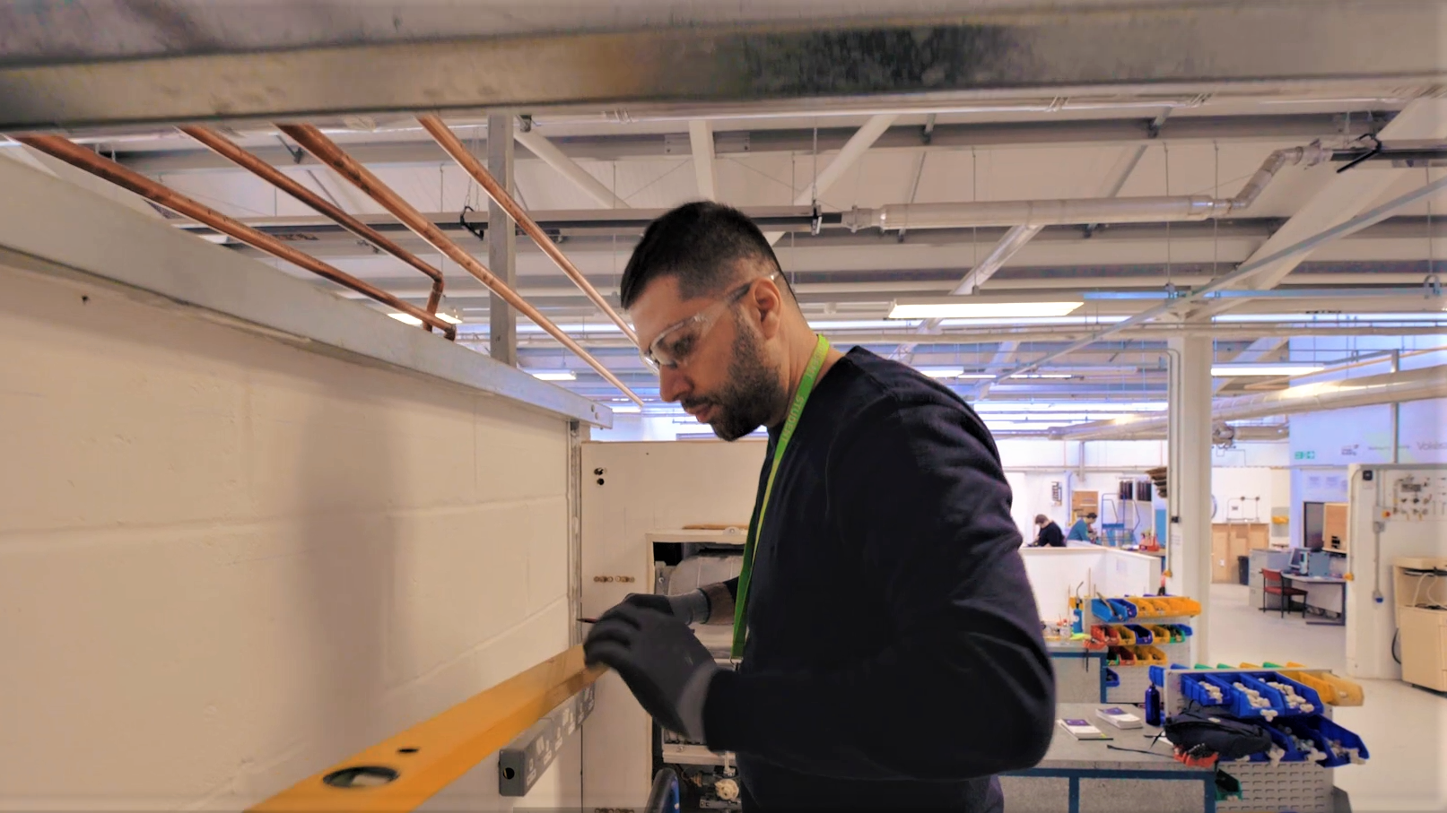 young man learning building skills